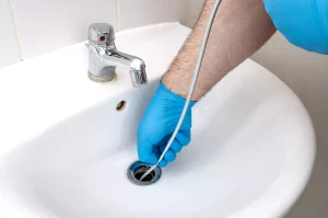 A clogged drain is a valid cause for complaint. If your drains become clogged, several issues may arise. How do you know whether to contact a plumber or septic service company? There is a significant difference between the two occupations; contrary to popular belief, they are not interchangeable. Plumbers are experts in the piping system that runs throughout your home. They can install pipes, faucets, garbage disposals, toilets, and water heaters. Septic companies handle the septic system located outside your home. This is primarily concerned with the revolves around the septic tank, which handles wastewater. Knowing who to call when you're having problems can help you save time and money. Continue reading for <span class="fuse-shortcode fuse-business-name">Top Tier Plumbing and Rooter</span> advice on choosing which service to call. If it turns out that you require septic tank services, rely on <span class="fuse-shortcode fuse-business-name">Top Tier Plumbing and Rooter</span> for assistance! Count the Number of Drains That Are Backed Up You may have first noticed the problem in the kitchen sink, but are there any other fixtures that are clogging? Examine all of the toilets, sinks, and bathtubs in the house to see if they have similar problems. If multiple fixtures are clogged, the issue is most likely with the septic tank. If only one fixture is clogged, you should call a plumber. However, if the problems are on the ground level or near the septic tank, they could be a septic problem. How Old Is Your Septic System? The septic system in your home, like anything else, deteriorates over time. Typically, a septic system will last about 25 years, but this can vary depending on usage, household size, and whether or not routine maintenance has been performed. If the septic tank is new, you should probably call a plumber. If the tank is older, it's time to contact a septic service. If you are unsure of the age of your septic system, a professional septic technician can inspect it and give you an estimate. Check Your Septic System Cleanout Find the short PVC pipe between your house and the tank, which normally stands out slightly or is occasionally level with the ground, to check the septic system cleanout. Look down into the cleanout after removing the cap. If there is no standing water, a problem exists between the cleanout and the house, and a plumber should be contacted. Standing water can indicate a blockage between the cleanout and the tank (call a plumber) or an overflowing septic tank (call a septic company). Or call [company] at <span class="fuse-shortcode fuse-phone fuse-phone-primary">(951) 475-6521</span> to make things even easier. We can assist you with drain or septic tank cleaning.